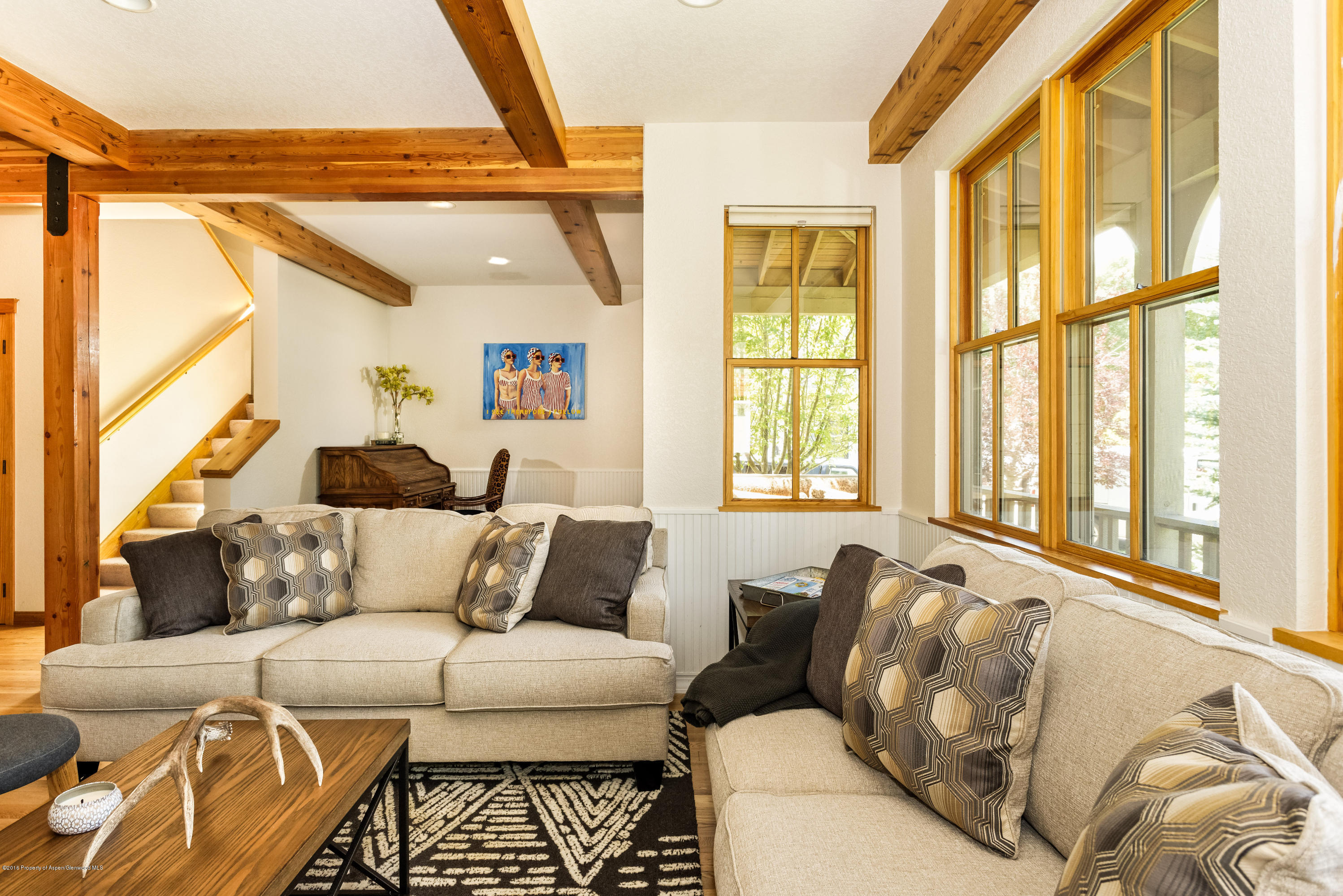 357 Sopris Circle Basalt, CO 81621 - Photo 4 of 24 a living room with furniture and a large window