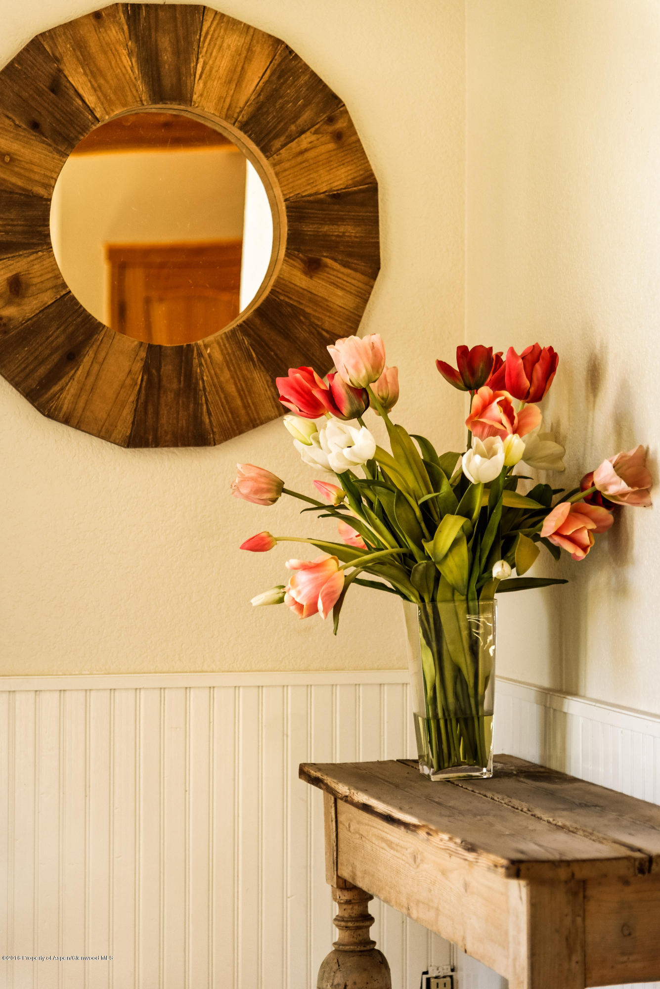 357 Sopris Circle Basalt, CO 81621 - Photo 10 of 24 a vase of flowers sitting on a table