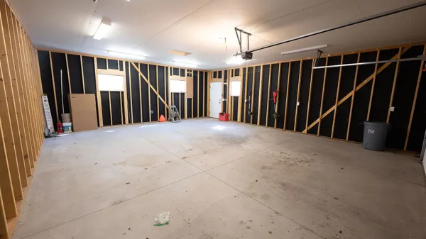a view of empty room with stairs and stairs