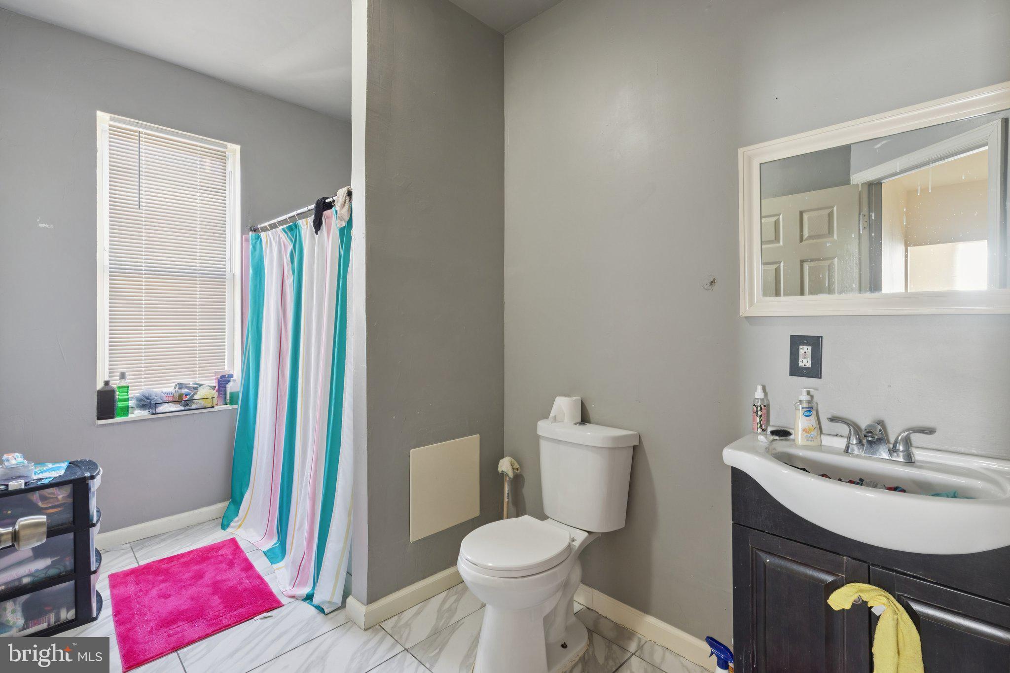 836 Haddon Avenue Camden, NJ 08103 - Photo 11 of 30 a bathroom with a sink toilet and vanity