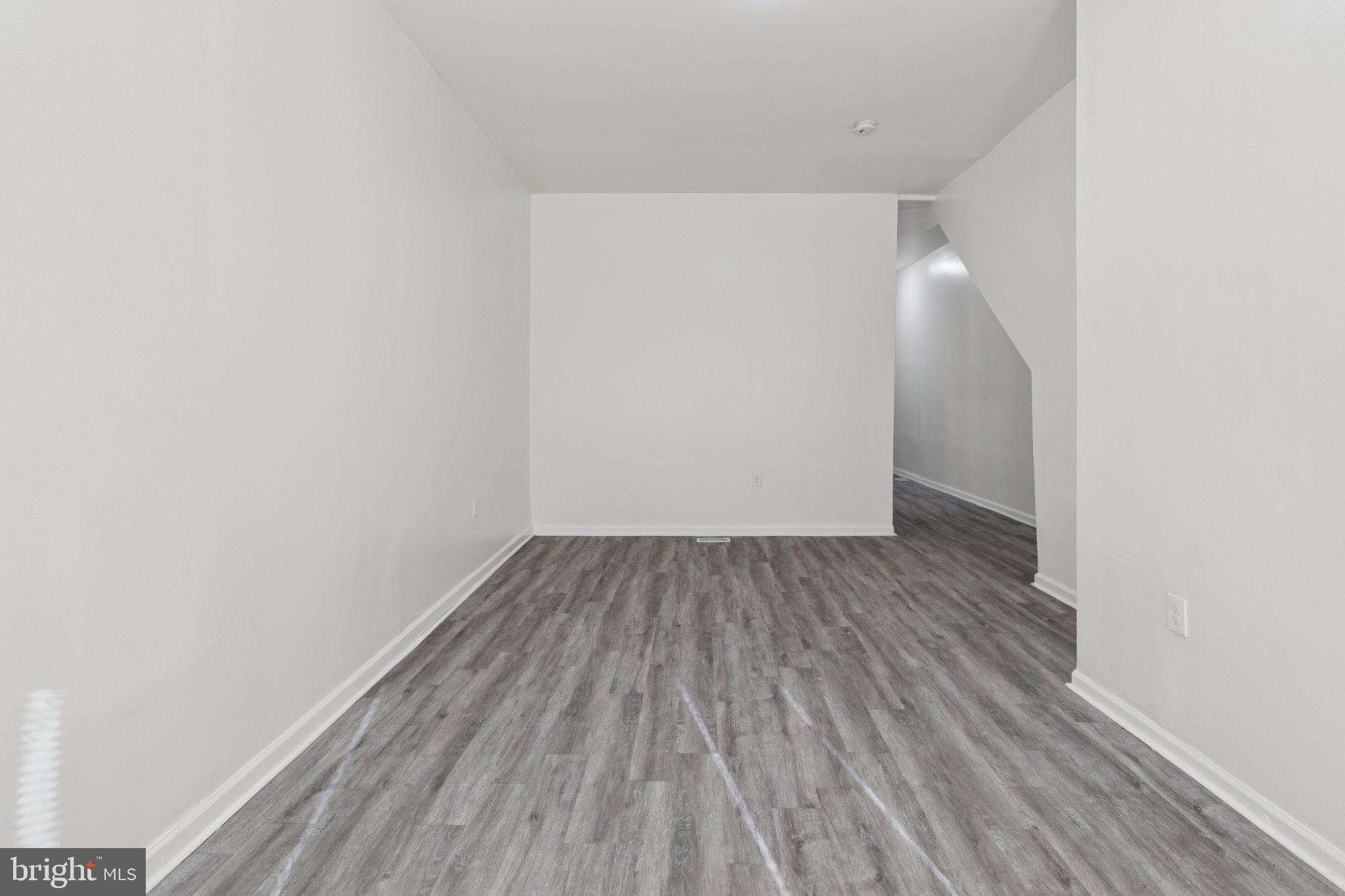 836 Haddon Avenue Camden, NJ 08103 - Photo 13 of 30 a view of a room with wooden floor