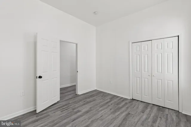 a bathroom with a sink toilet and mirror