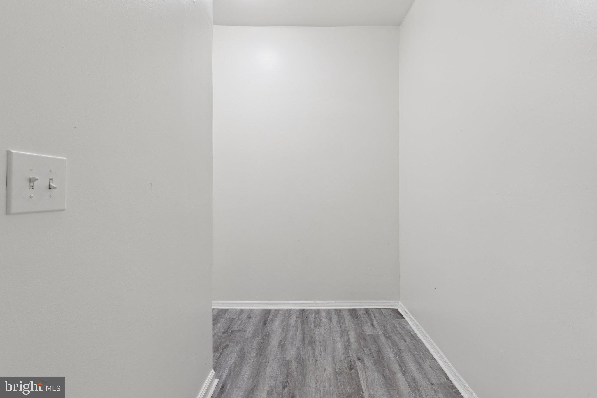 836 Haddon Avenue Camden, NJ 08103 - Photo 25 of 30 a view of small space with wooden floor