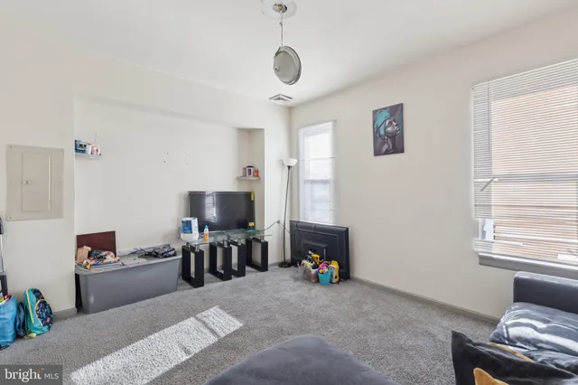 a living room with furniture and a couch