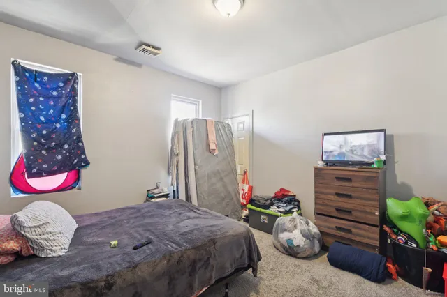 a bathroom with a sink toilet and vanity