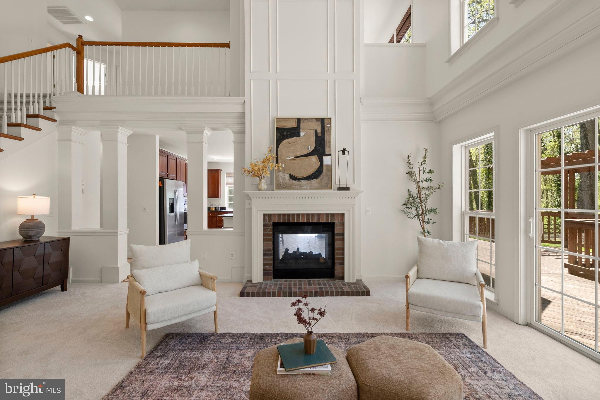 6015 Traceys Landing Road Tracys Landing, MD 20779 - Photo 15 of 68 Two story family room with dual sided fireplace