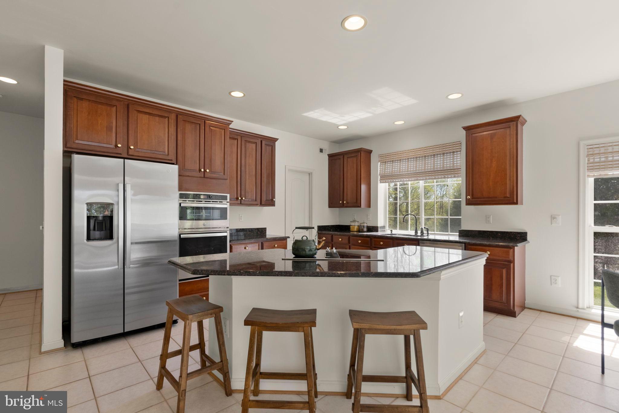 6015 Traceys Landing Road Tracys Landing, MD 20779 - Photo 27 of 68 Center island with new cooktop