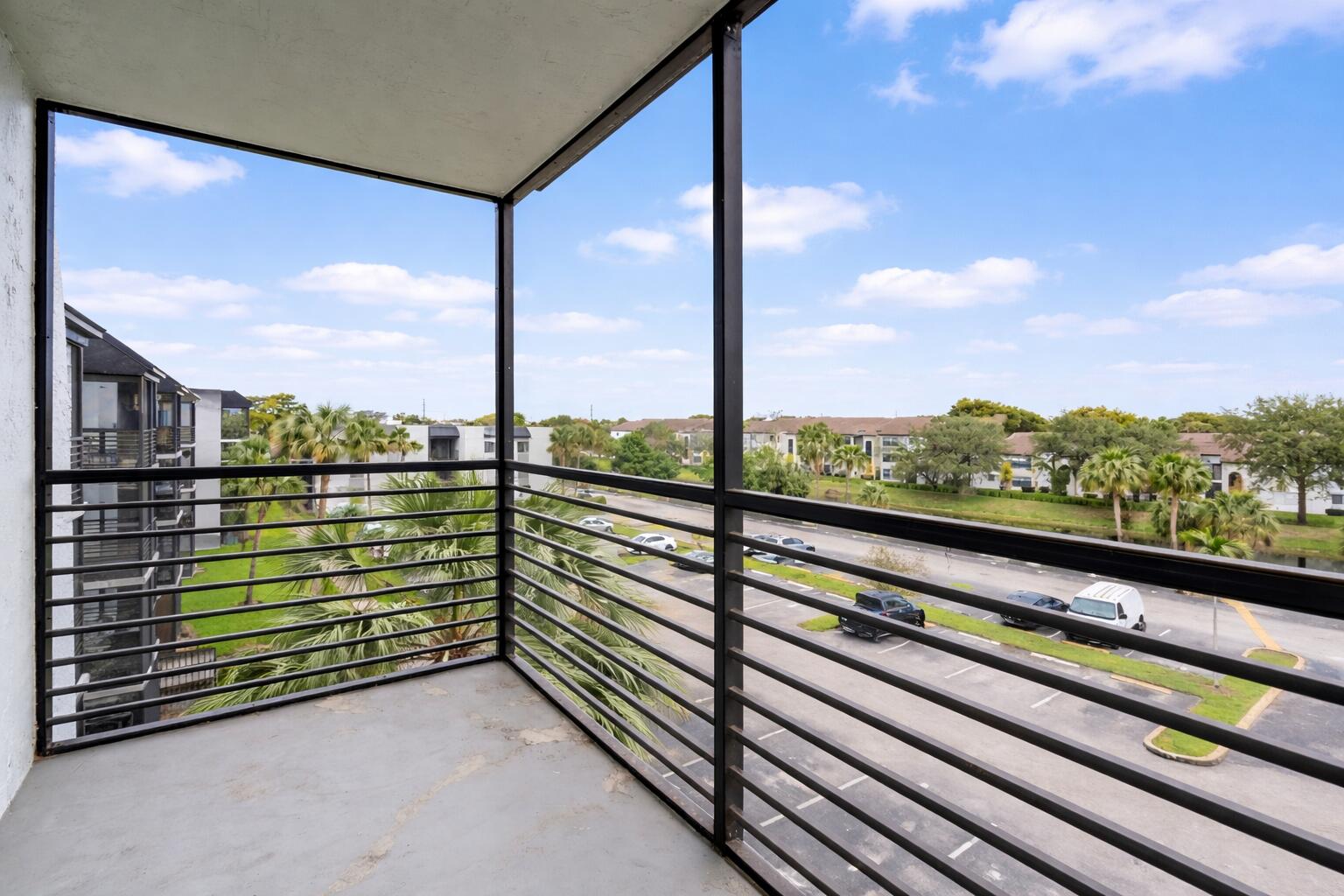 3720 North Pine Island Road, Unit 436 Sunrise, FL 33351 - Photo 1 of 26 a view of city from a balcony