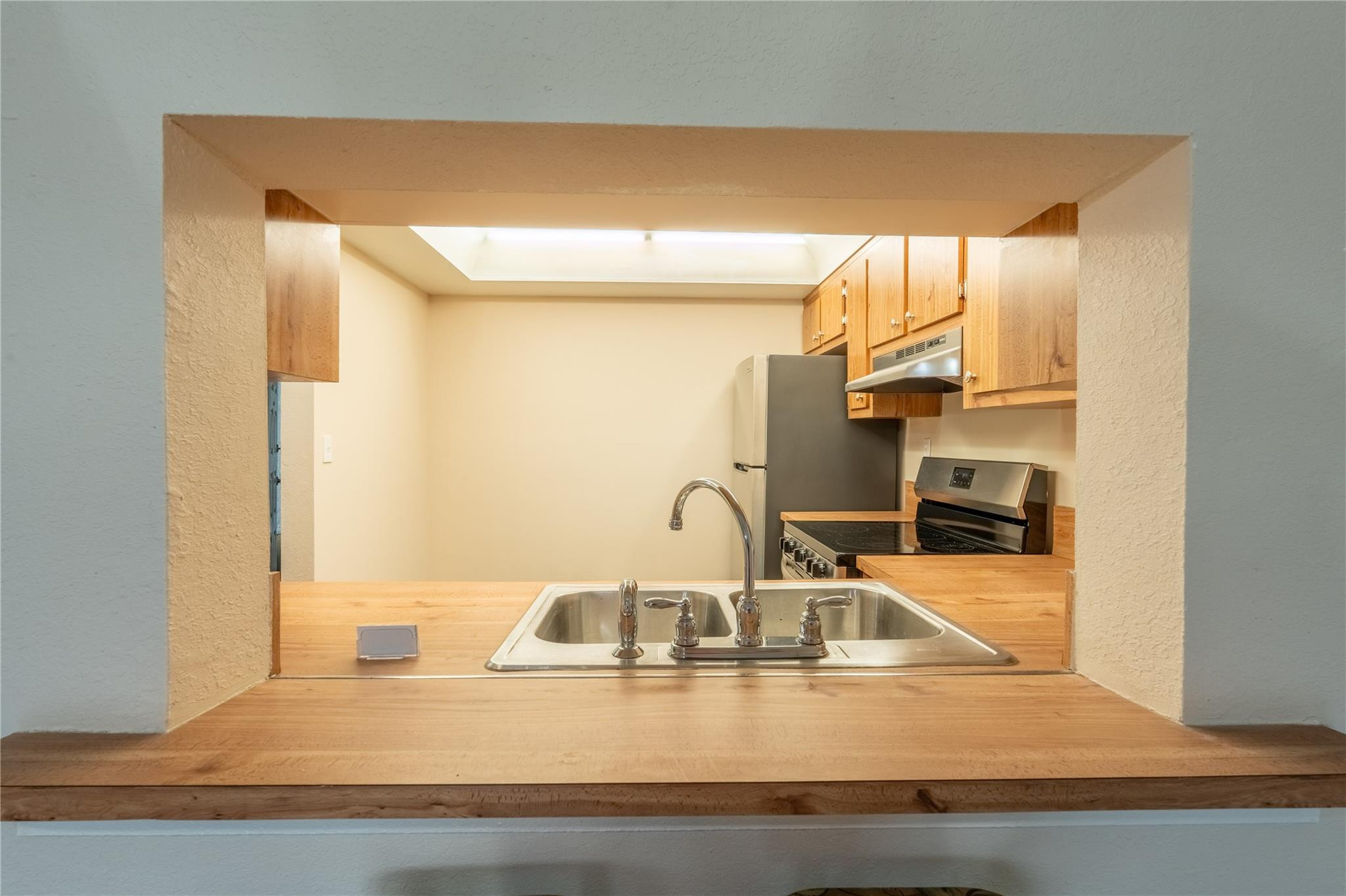 3720 North Pine Island Road, Unit 436 Sunrise, FL 33351 - Photo 22 of 26 a kitchen with a sink and a window