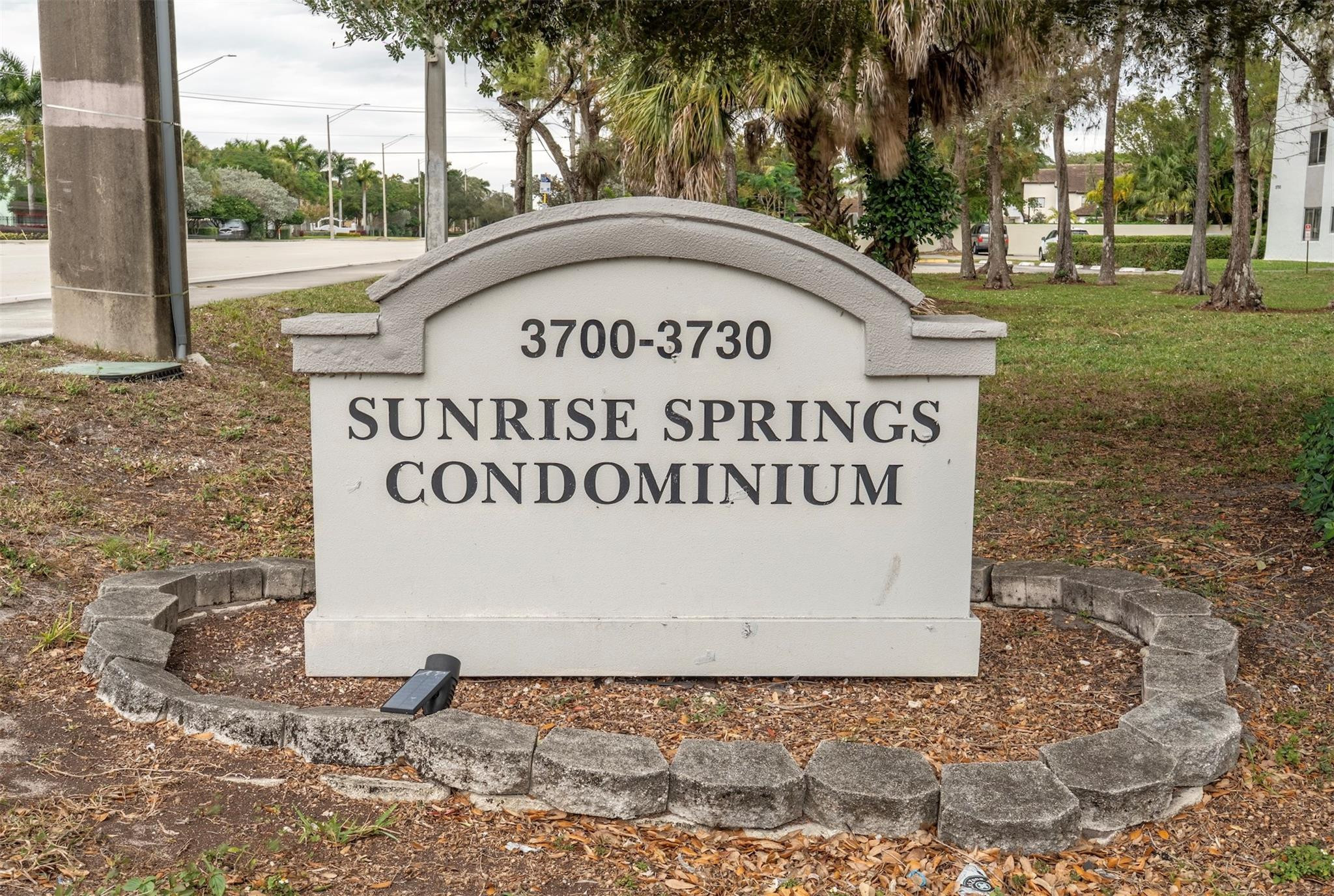 3720 North Pine Island Road, Unit 436 Sunrise, FL 33351 - Photo 26 of 26 a sign on the side of a building