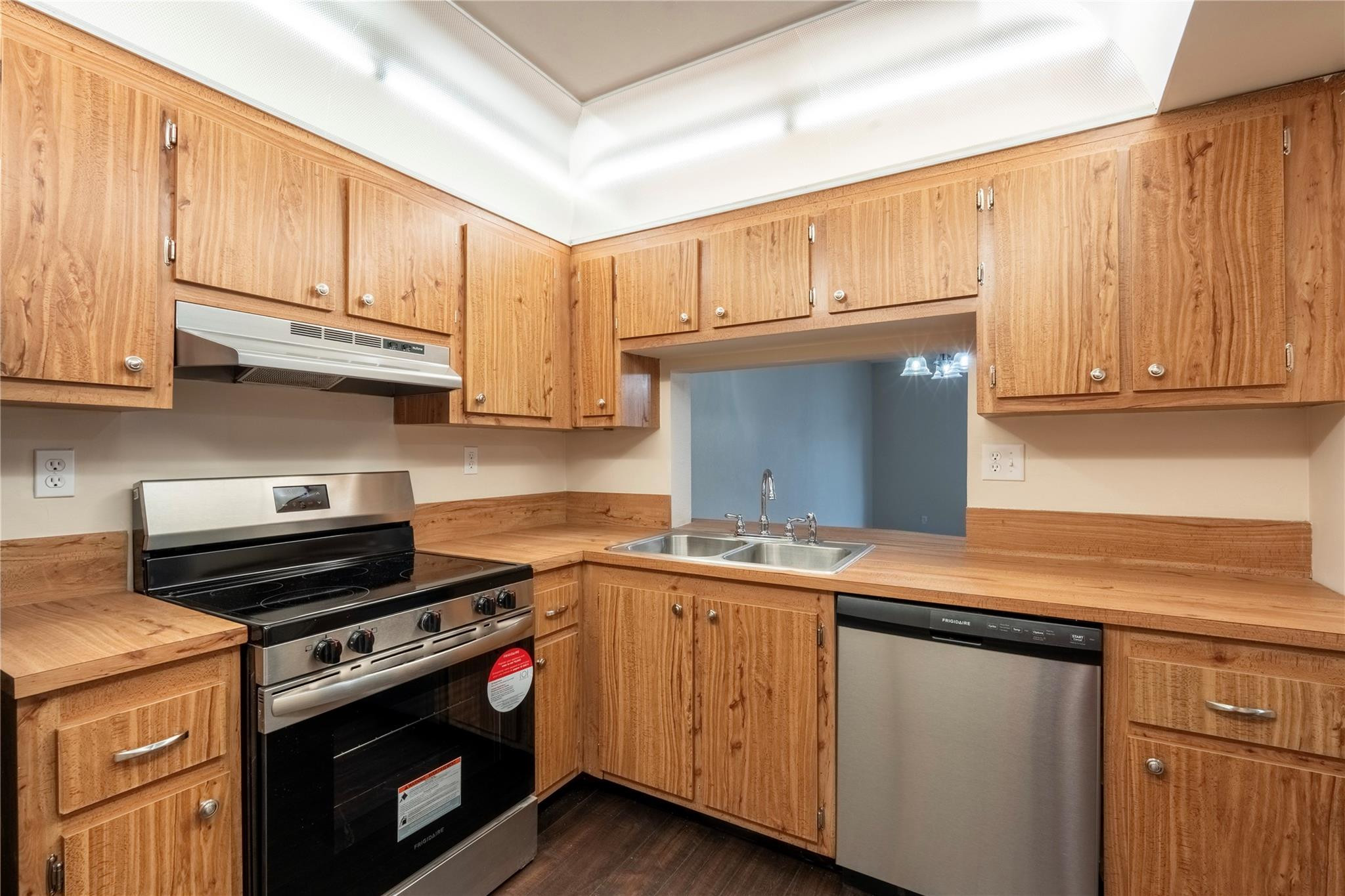 3720 North Pine Island Road, Unit 436 Sunrise, FL 33351 - Photo 3 of 26 a kitchen with a sink and cabinets