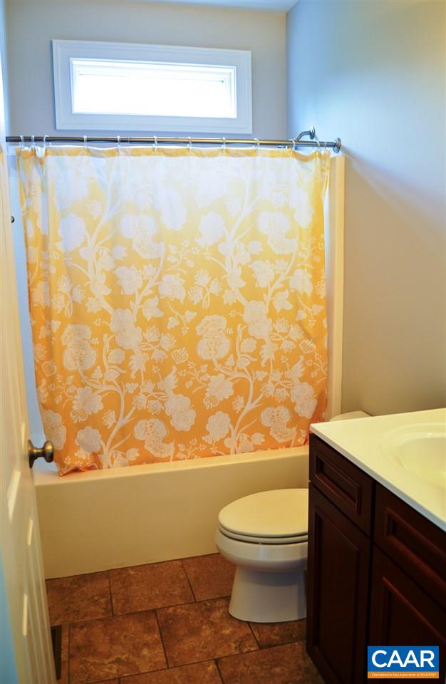 70 Ridgeview Drive Ruckersville, VA 22968 - Photo 24 of 48 a bathroom with a toilet a sink and a shower