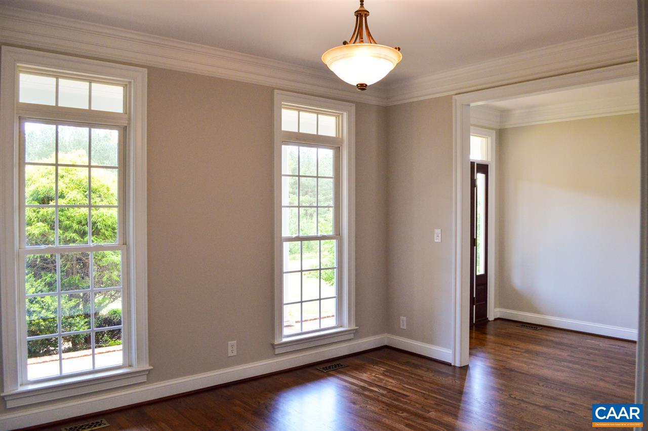 70 Ridgeview Drive Ruckersville, VA 22968 - Photo 5 of 48 a view of an empty room with wooden floor and a window