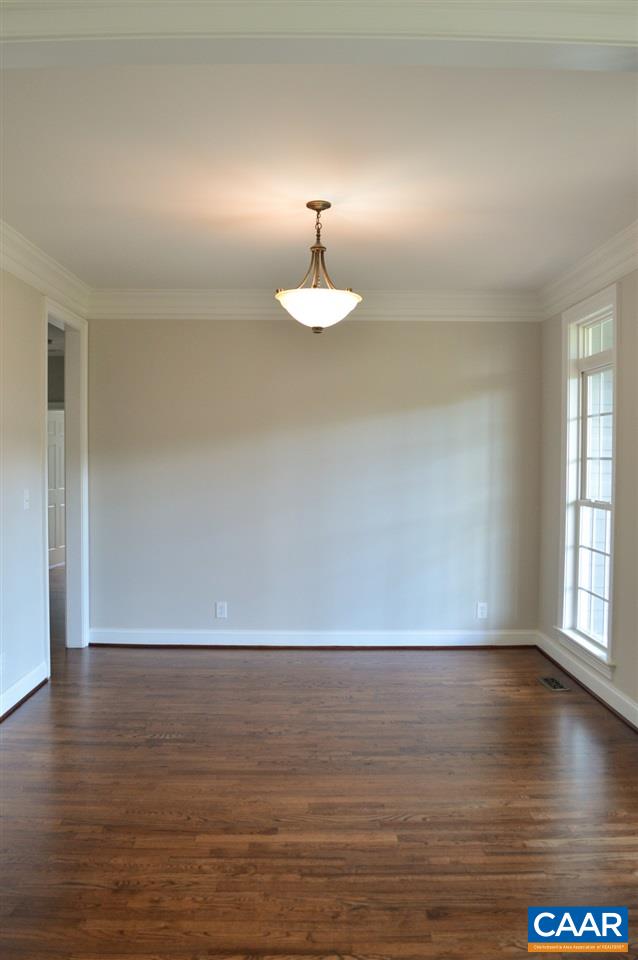 70 Ridgeview Drive Ruckersville, VA 22968 - Photo 6 of 48 a view of wooden floor fire place and windows in an empty room
