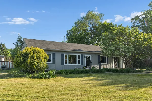 a view of a house with a swimming pool