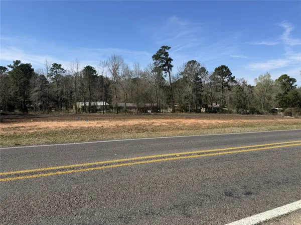 a view of a house and a yard