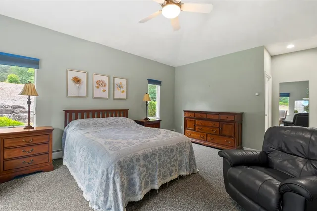 a spacious bathroom with sink and bathtub
