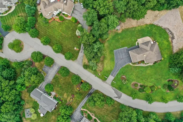 a kitchen with stainless steel appliances a stove refrigerator sink and microwave