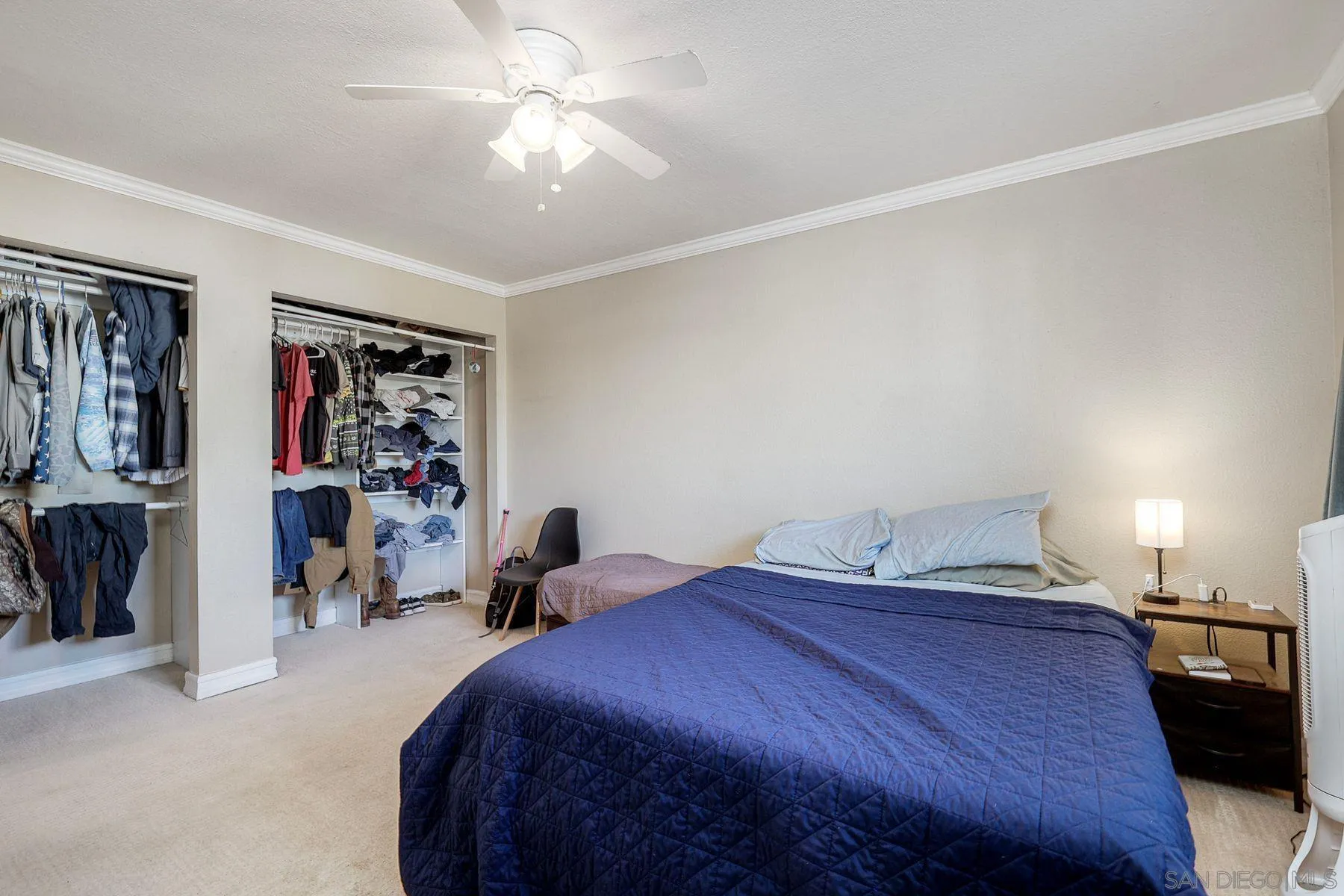 12923 Mapleview Street, Unit 6 Lakeside, CA 92040 - Photo 20 of 25 a bedroom with a bed and a ceiling fan