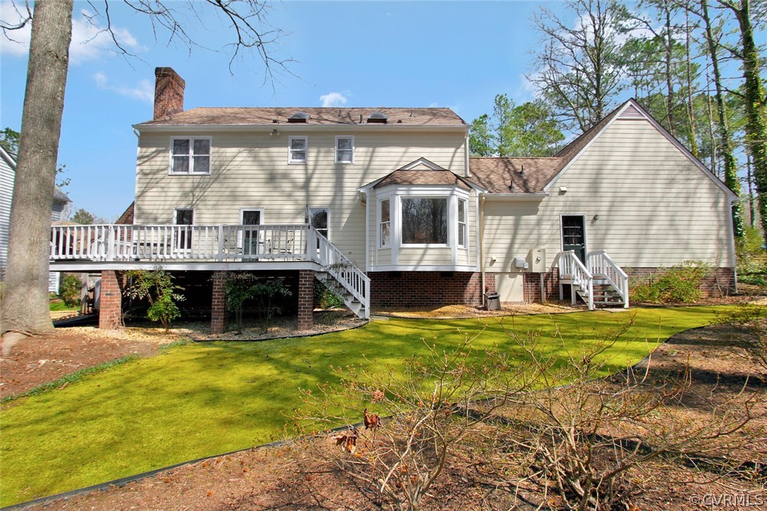 14303 Spring Gate Road Midlothian, VA 23112 - Photo 29 of 30 a view of a house with a swimming pool