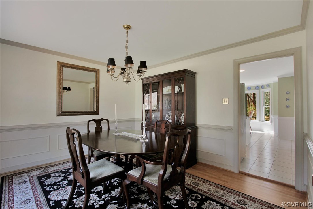 14303 Spring Gate Road Midlothian, VA 23112 - Photo 6 of 30 a dining room with furniture and window