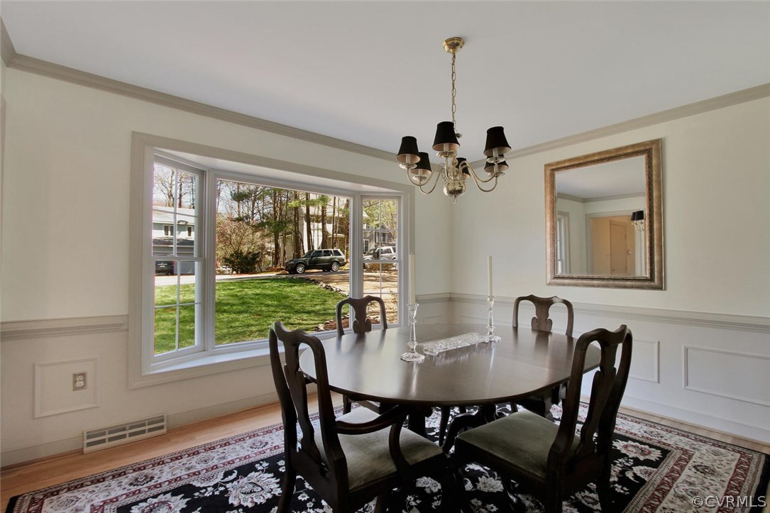 14303 Spring Gate Road Midlothian, VA 23112 - Photo 7 of 30 a view of a dining room with furniture window and outside view