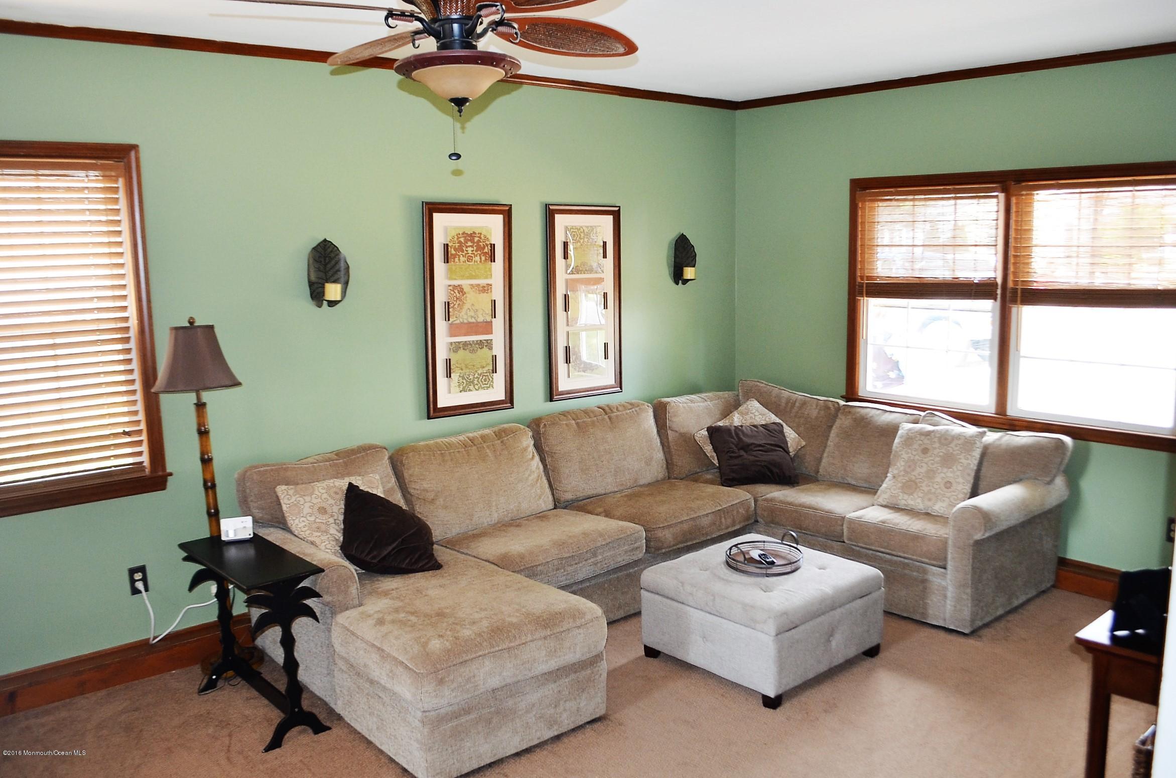 2216 Wilson Road Point Pleasant, NJ 08742 - Photo 8 of 20 a living room with furniture and a window