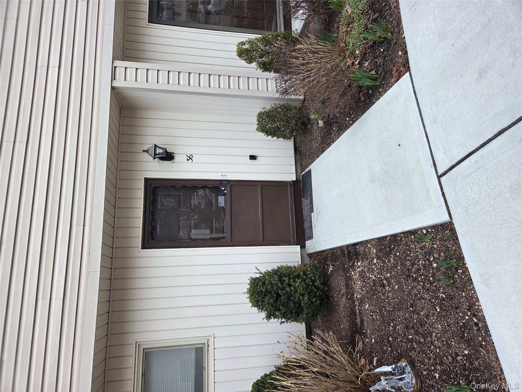 a view of a back yard of the house