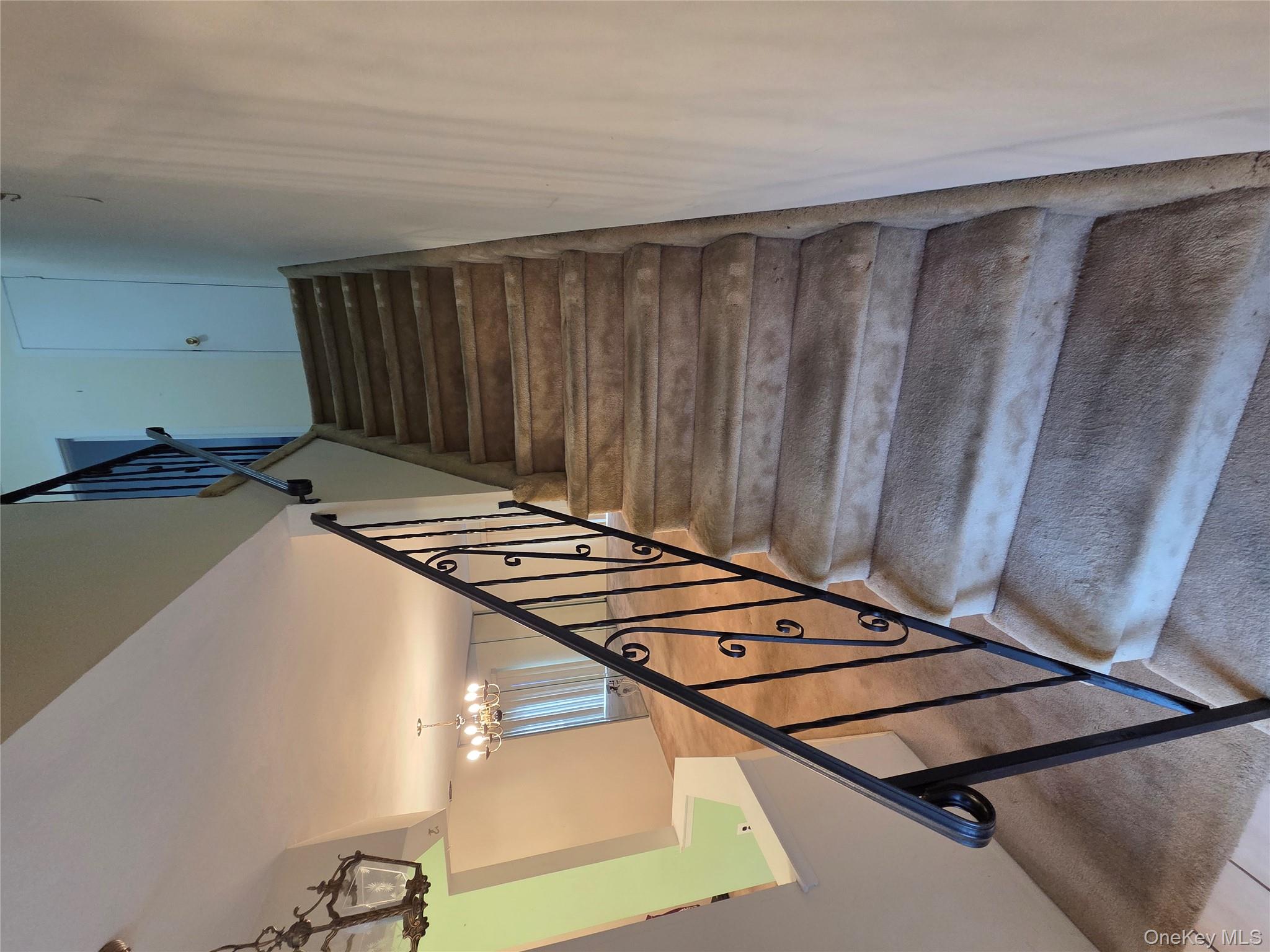 650 Newbridge Road, Unit 36 East Meadow, NY 11554 - Photo 9 of 14 a view of entryway