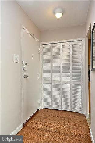 1210 North Taft Street, Unit 903 Arlington, VA 22201 - Photo 13 of 21 an empty room with wooden floor