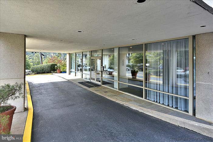 1210 North Taft Street, Unit 903 Arlington, VA 22201 - Photo 15 of 21 a view of a room with large windows
