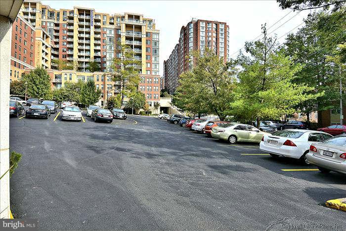 1210 North Taft Street, Unit 903 Arlington, VA 22201 - Photo 19 of 21 a cars parked in front of a building