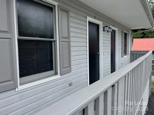 a view of a car parked on the balcony