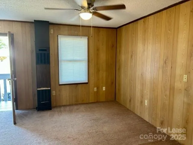 a kitchen with a refrigerator and a sink