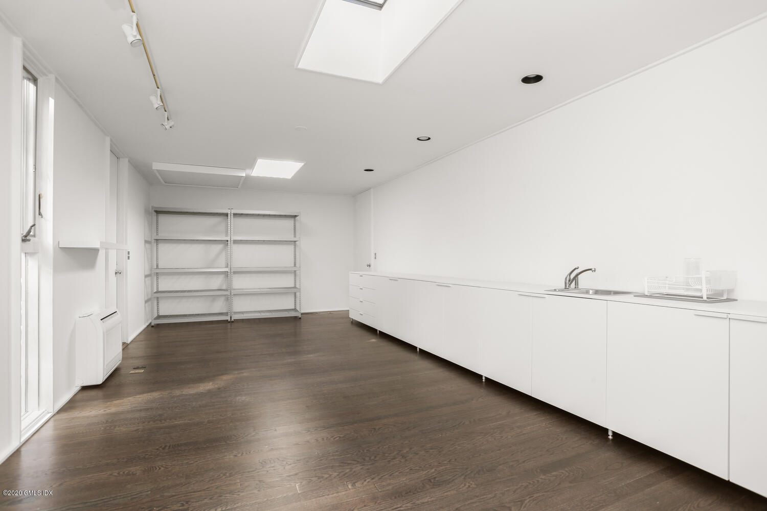 26 Chalburn Road Redding, CT 06896 - Photo 12 of 19 a view of a livingroom with wooden floor