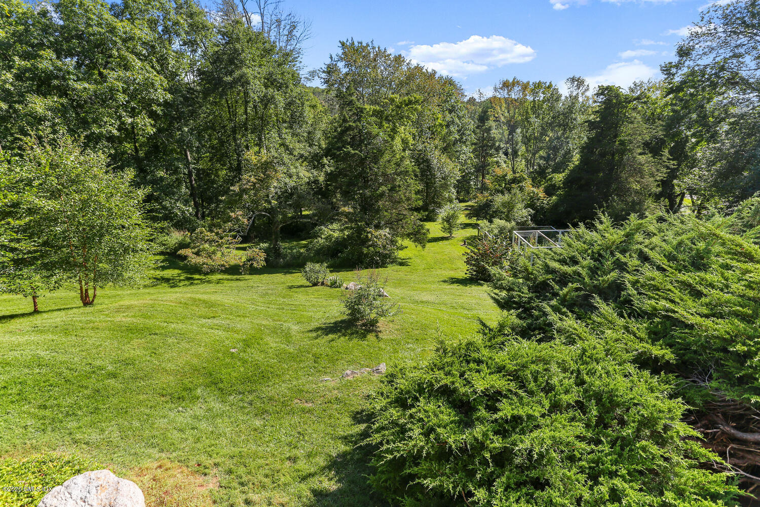 26 Chalburn Road Redding, CT 06896 - Photo 16 of 19 a view of a garden