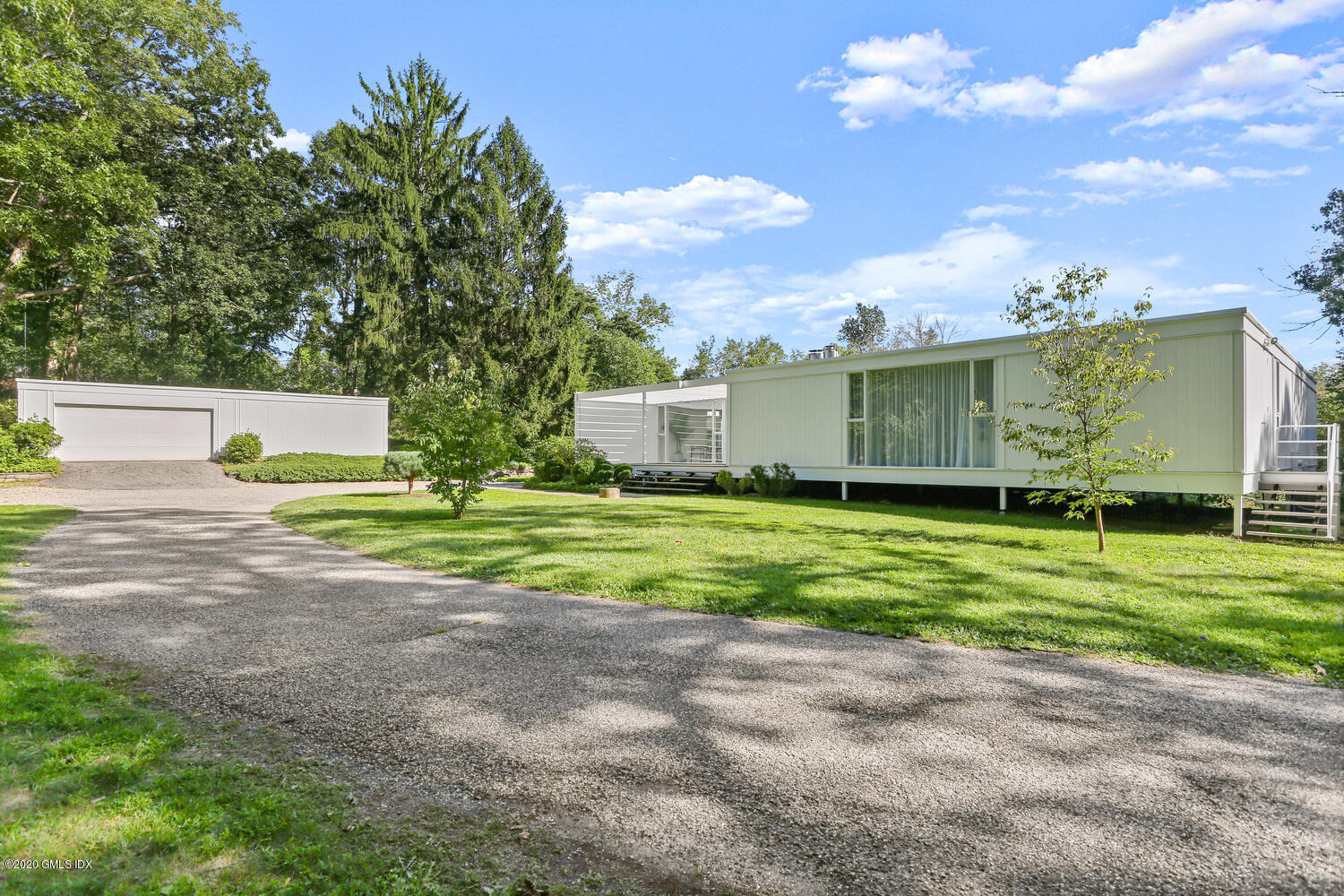 26 Chalburn Road Redding, CT 06896 - Photo 17 of 19 a view of a house with a big yard and large trees