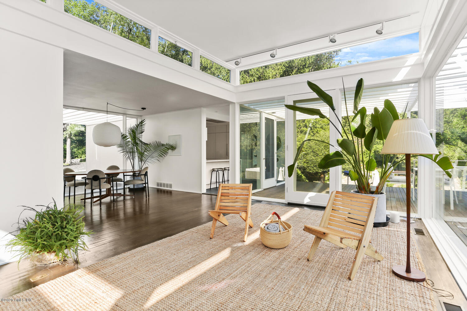 26 Chalburn Road Redding, CT 06896 - Photo 5 of 19 a living room with patio furniture and a potted plant