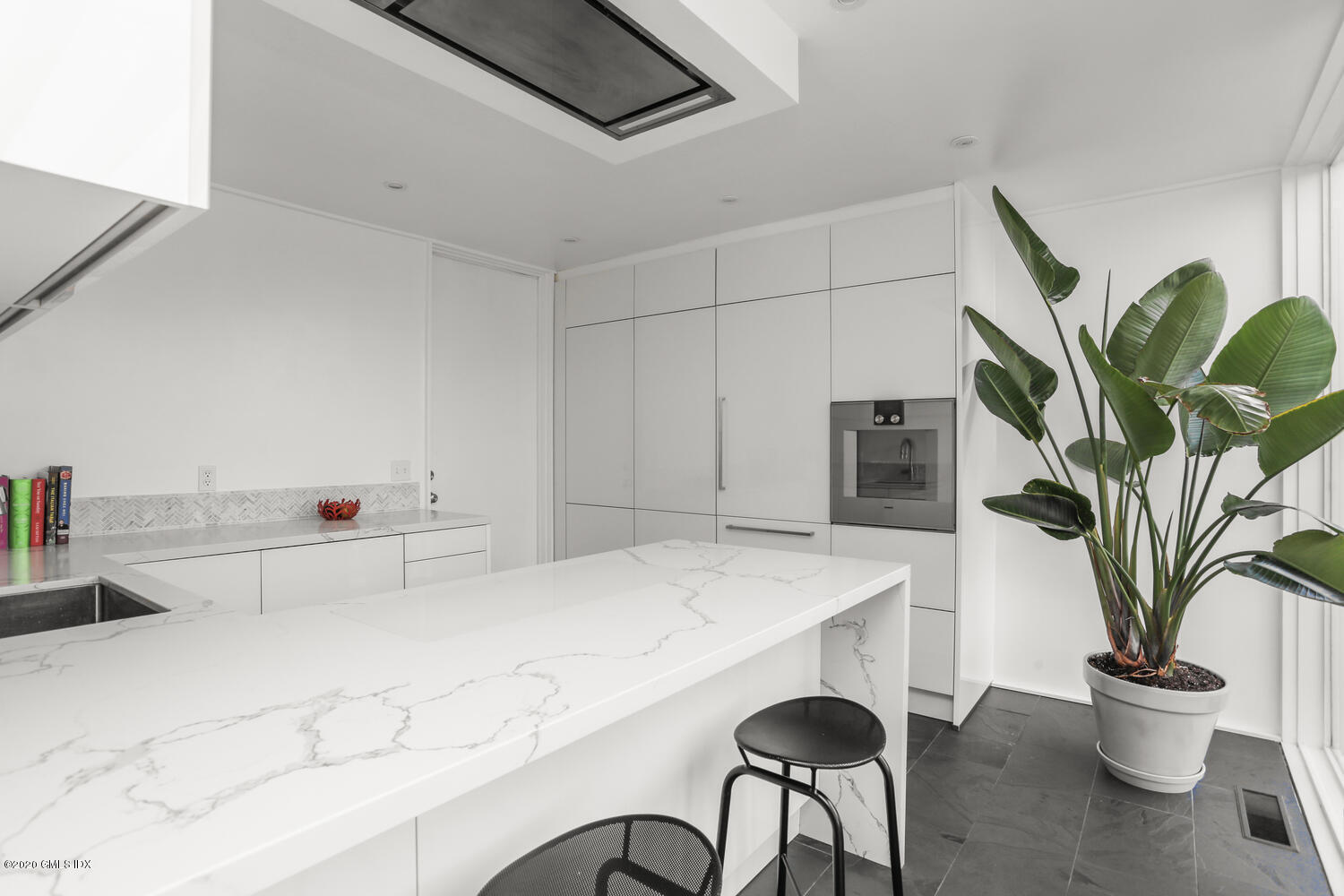 26 Chalburn Road Redding, CT 06896 - Photo 7 of 19 a living room with furniture and potted plant