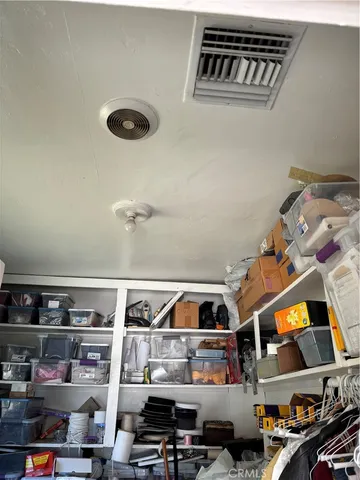 a view of storage and utility room