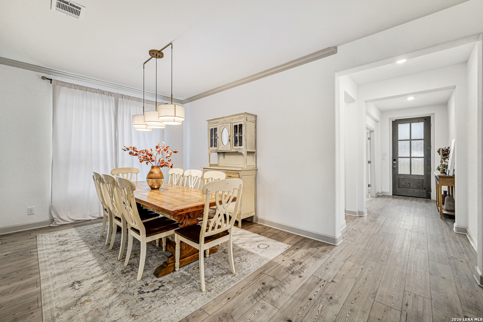 110 Breamoor Boerne, TX 78015 - Photo 13 of 38 a view of a dining room with furniture window and wooden floor