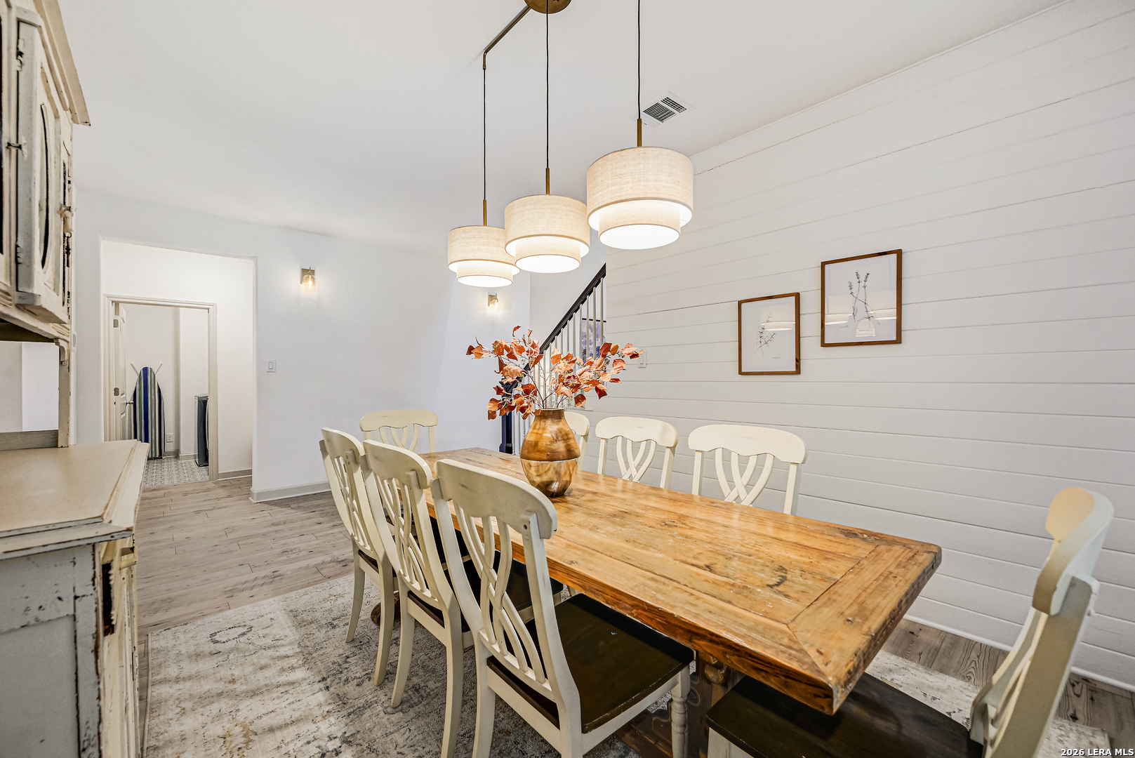 110 Breamoor Boerne, TX 78015 - Photo 14 of 38 a dining room filled chandelier and wooden floor