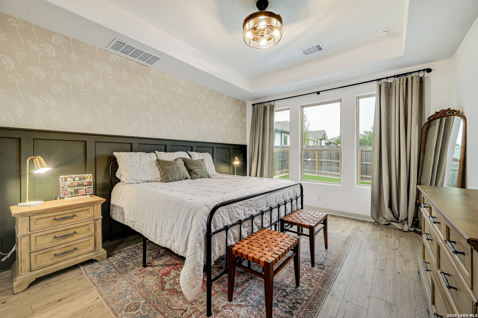 110 Breamoor Boerne, TX 78015 - Photo 21 of 38 a bedroom with a bed and a table in it