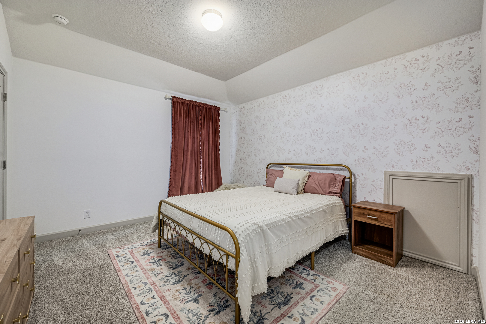 110 Breamoor Boerne, TX 78015 - Photo 31 of 38 a bedroom with a bed and a window