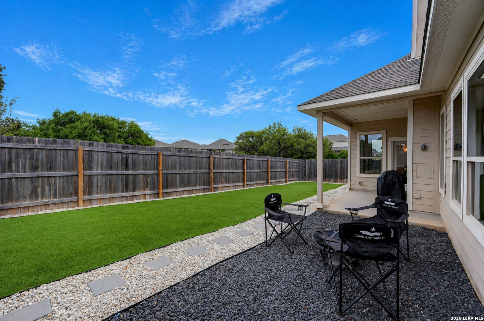 110 Breamoor Boerne, TX 78015 - Photo 35 of 38 a view of a backyard with sitting area and garden