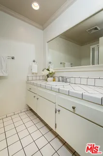 a bed room with a bed and a couch