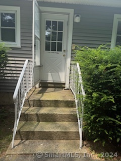 655 West Avenue, Unit BACK Milford, CT 06461 - Photo 2 of 18 a view of statue in front of house