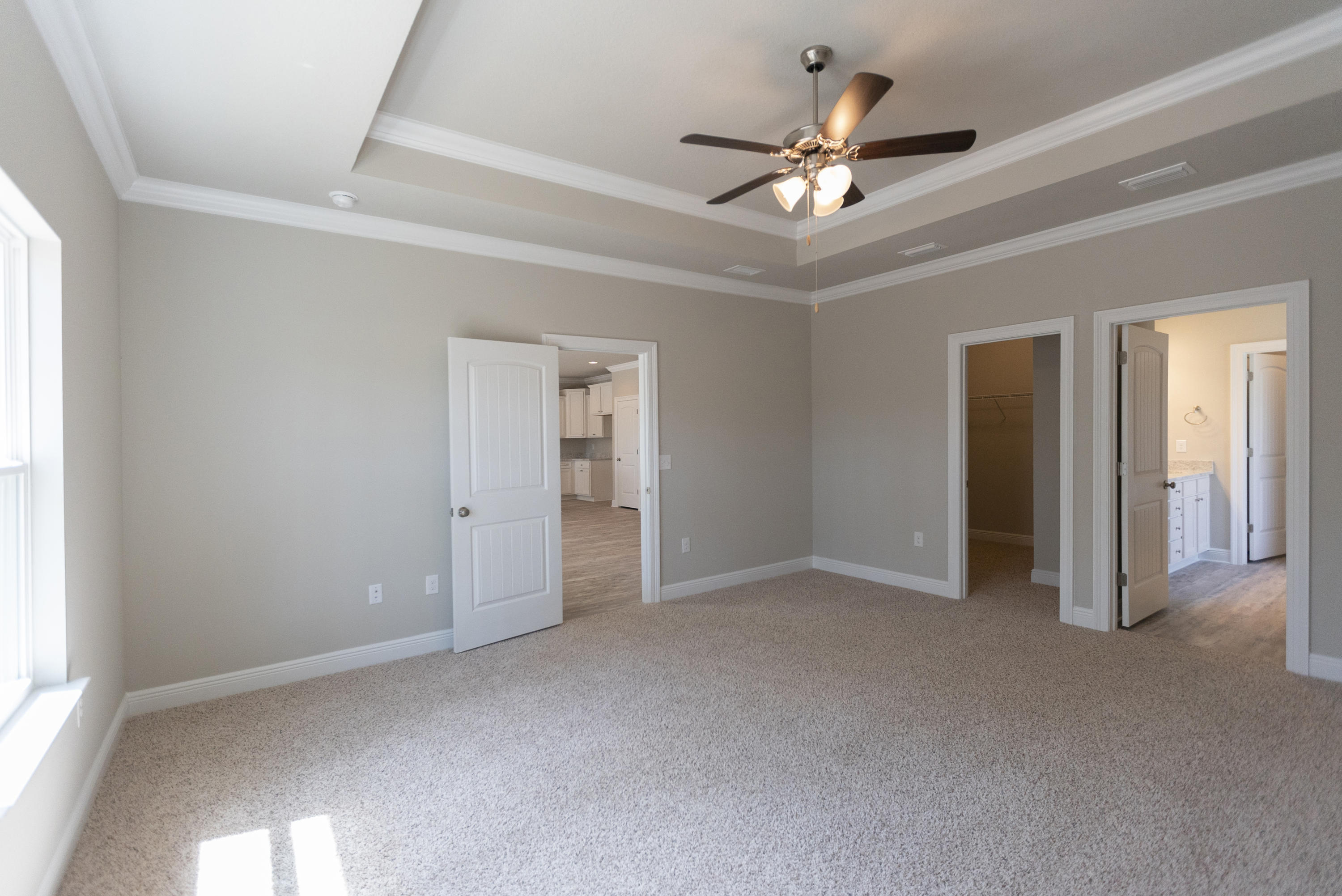 396 Wayne Trail Santa Rosa Beach, FL 32459 - Photo 13 of 30 a view of an empty room with a ceiling fan