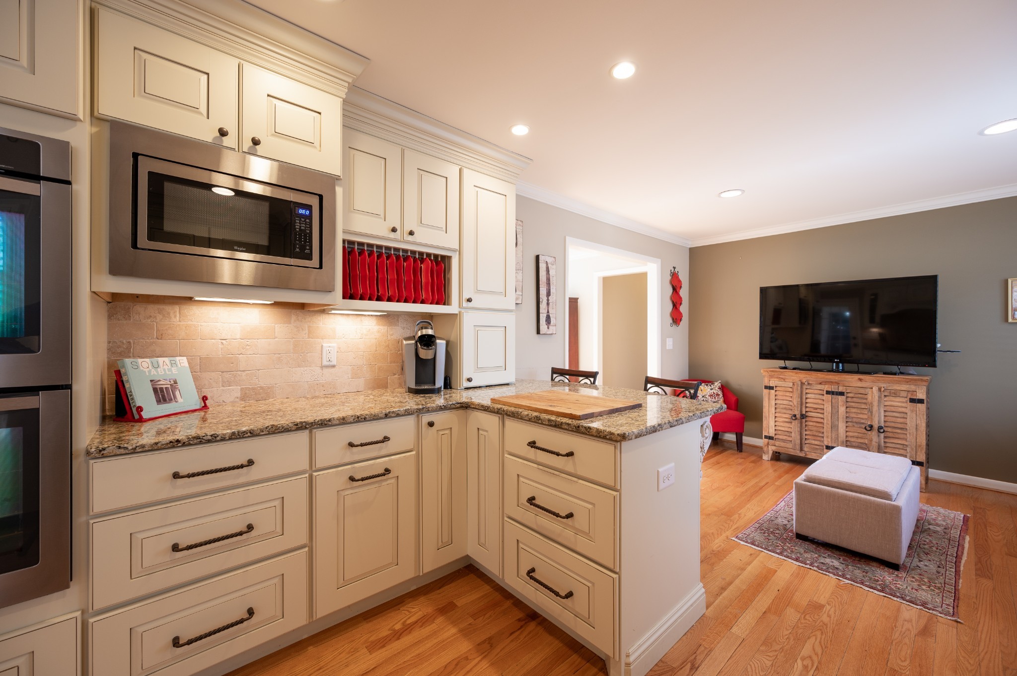 1208 Davidson Road Nashville, TN 37205 - Photo 13 of 30 a kitchen with stainless steel appliances white cabinets and a wooden floor
