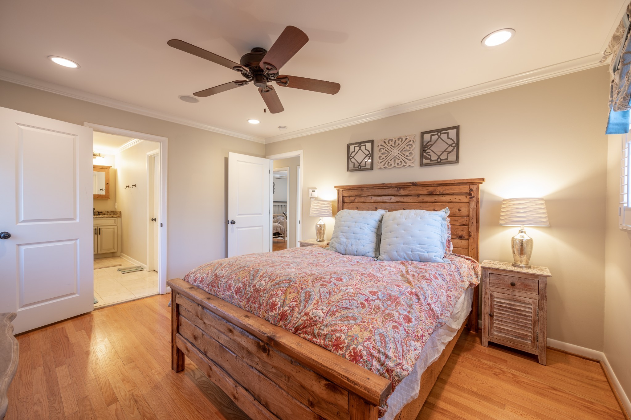 1208 Davidson Road Nashville, TN 37205 - Photo 17 of 30 a bedroom with a bed and a chandelier